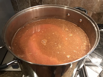Parboiling the baby back ribs