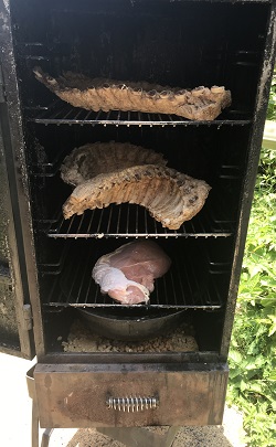 Smoker with raw meat in it