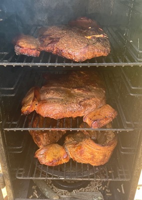 Briskets in smoker